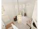 Bright living room with a ceiling fan, light fixtures, and a sliding door at 68 Belle Soleil Ave, Las Vegas, NV 89123