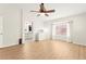 Bright main bedroom with bathroom access, ceiling fan, and spacious floor plan at 68 Belle Soleil Ave, Las Vegas, NV 89123