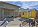 View of the backyard with patio, storage shed and exterior pump system at 722 Barrie Ct, Henderson, NV 89002
