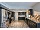 Spacious kitchen featuring stainless steel appliances, granite countertops, and ample cabinet space at 722 Barrie Ct, Henderson, NV 89002