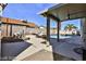Covered patio with outdoor seating and a view of the swimming pool at 722 Barrie Ct, Henderson, NV 89002