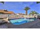 Backyard pool with a diving board, patio, and a bright blue sky at 722 Barrie Ct, Henderson, NV 89002