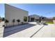 Wide backyard view showing outdoor seating, landscaping and modern architectural details at 787 Willits St, Las Vegas, NV 89138