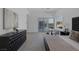 Relaxing bedroom featuring black furniture and views of the outdoor space at 787 Willits St, Las Vegas, NV 89138
