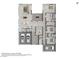 Detailed floor plan showcasing a spacious layout with a living area, modern kitchen, bedrooms, and attached garages at 787 Willits St, Las Vegas, NV 89138