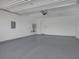 Spacious garage with neutral colored epoxy flooring at 787 Willits St, Las Vegas, NV 89138