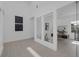 Bright office space with large windows and modern decor including a desk, chair and artwork at 787 Willits St, Las Vegas, NV 89138
