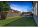Spacious backyard featuring a putting green and outdoor seating at 7890 S Miller Ln, Las Vegas, NV 89113