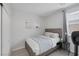 Comfortable bedroom with soft bedding, natural light, and ample closet space at 7890 S Miller Ln, Las Vegas, NV 89113