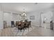 Elegant dining room featuring a decorative chandelier, and open layout at 7890 S Miller Ln, Las Vegas, NV 89113
