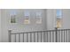 Bright hallway featuring serene views, natural light, and staircase access at 7890 S Miller Ln, Las Vegas, NV 89113