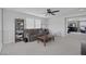 Cozy living room adjacent to the Primary bedroom with a comfortable couch and entertainment setup at 7890 S Miller Ln, Las Vegas, NV 89113