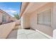 The property showcases a secure gated entry and a covered patio for enhanced privacy and curb appeal at 7920 Turtle Island Ct, Las Vegas, NV 89129