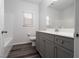This bathroom features a vanity with cabinet space and shower-tub combo at 817 Cottonwood Hill Pl, Henderson, NV 89011