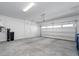 A spacious and bright two-car garage with an automatic door at 817 Cottonwood Hill Pl, Henderson, NV 89011