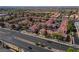 Planned community with pool, manicured landscaping, convenient street access, and red tile roofs at 8455 W Sahara Ave # 289, Las Vegas, NV 89117