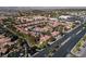 An aerial view of a Las Vegas neighborhood with apartment buildings, parking, and landscaping at 8455 W Sahara Ave # 289, Las Vegas, NV 89117