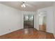 Bedroom with laminate floors, ceiling fan and access to private balcony with a view at 8455 W Sahara Ave # 289, Las Vegas, NV 89117