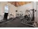 Community gym features high ceilings, wood beams, and a variety of exercise machines at 8455 W Sahara Ave # 289, Las Vegas, NV 89117