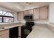 Modern kitchen features granite countertops, sleek appliances, and ample cabinet space at 8455 W Sahara Ave # 289, Las Vegas, NV 89117