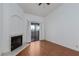 Living room with wood flooring, fireplace, and sliding door with access to the outside at 8455 W Sahara Ave # 289, Las Vegas, NV 89117
