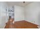 Living room with wood floors, neutral paint, and access to other rooms at 8455 W Sahara Ave # 289, Las Vegas, NV 89117