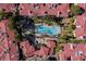 A lovely view of the community pool surrounded by palm trees and lawn chairs at 8455 W Sahara Ave # 289, Las Vegas, NV 89117