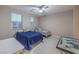 Spacious bedroom with a desk and two beds at 8984 Rolling Pietra St, Las Vegas, NV 89166
