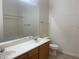 Well-lit bathroom with double sink vanity and shower-tub combination at 8985 S Durango Dr # 2043, Las Vegas, NV 89113