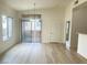 Open living room featuring luxury vinyl floors and natural light at 8985 S Durango Dr # 2043, Las Vegas, NV 89113