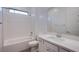 Well-lit bathroom featuring a white vanity, a shower-over-tub combination, and modern fixtures at 909 Allister Fields Ln, Las Vegas, NV 89138