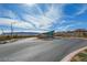Welcoming entrance to the Heritage community with well-maintained landscaping at 909 Allister Fields Ln, Las Vegas, NV 89138