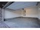 Spacious two-car garage with a clean and modern design, ready for vehicle parking and storage at 909 Allister Fields Ln, Las Vegas, NV 89138