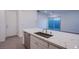 Bright kitchen featuring a quartz countertop, stainless steel appliances, and stylish sink at 909 Allister Fields Ln, Las Vegas, NV 89138