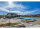 Luxurious community pool with comfortable lounge chairs, set against a backdrop of desert scenery at 909 Allister Fields Ln, Las Vegas, NV 89138