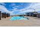 Inviting community pool area with clear blue water and plenty of space for relaxation and recreation at 909 Allister Fields Ln, Las Vegas, NV 89138