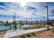 Well-maintained tennis and pickleball courts surrounded by scenic mountain views, perfect for recreation at 909 Allister Fields Ln, Las Vegas, NV 89138