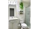 Bright bathroom featuring modern fixtures, vanity, decorative shelves, and glass enclosed shower at 9205 Valley Betica Ave, Las Vegas, NV 89148