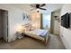 Comfortable bedroom featuring plush bed, stylish decor, and soft natural light at 9205 Valley Betica Ave, Las Vegas, NV 89148