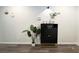 Bright entryway featuring modern decor, stylish storage, and a welcoming ambiance with wood floor at 9205 Valley Betica Ave, Las Vegas, NV 89148