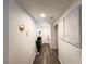 Inviting hallway with modern decor, showcasing the home's style with luxury vinyl plank flooring at 9205 Valley Betica Ave, Las Vegas, NV 89148
