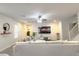 Bright living room with comfortable sofa, entertainment area, and modern decor, ideal for relaxation at 9205 Valley Betica Ave, Las Vegas, NV 89148