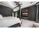 Another view of the spacious bedroom featuring a four-poster bed and built-in shelving at 9325 Canyon Classic Dr, Las Vegas, NV 89144