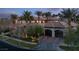 Stunning home with mature trees, tile roof, and a spacious three-car garage at 9325 Canyon Classic Dr, Las Vegas, NV 89144