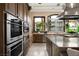 Kitchen with stainless steel appliances and granite countertops at 9325 Canyon Classic Dr, Las Vegas, NV 89144