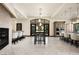Open concept kitchen with a large island, a fireplace, and stainless steel appliances at 9325 Canyon Classic Dr, Las Vegas, NV 89144