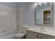This bathroom includes a shower/tub combo and large vanity at 950 Marbelwood Ave, Las Vegas, NV 89123