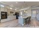 Modern kitchen features updated cabinets, sleek countertops, stainless steel appliances, and a breakfast bar at 950 Marbelwood Ave, Las Vegas, NV 89123