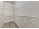 This walk-in closet features wood-look flooring and wire shelving at 950 Marbelwood Ave, Las Vegas, NV 89123
