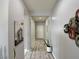 Inviting entryway featuring modern decor, neutral paint, and stylish laminate flooring at 9604 Vital Crest St, Las Vegas, NV 89123